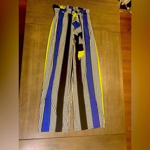 These are multi-color pants from Ashley Stewart with black stripes .